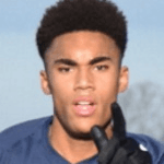 Кенни Кокер