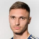 А. Колундзич