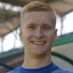 Дж. Сзиманьски