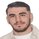 М. Адигузел