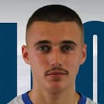 Л. Ксхилани