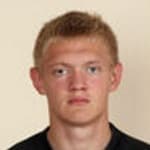 Т. Акмурзин